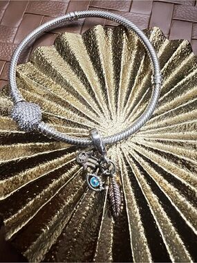 Pandora Silver Bracelet with Blue Evil Eye and Feather Charms